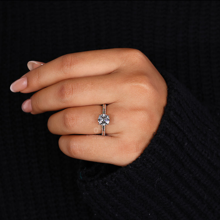 Round diamond engagement ring in knife edge pave setting ring
