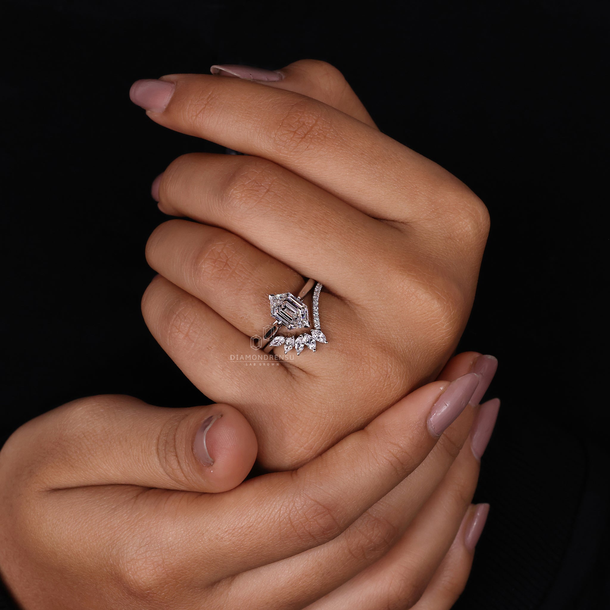 Custom bridal set featuring a tiara band and round diamond accents.
