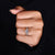 Tapered pave set combined with 4 claw prong setting.
