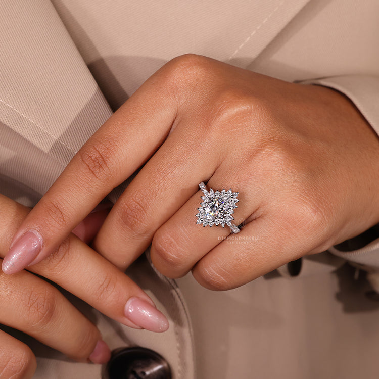 Marquise halo engagement ring in handmade jewellery collection.
