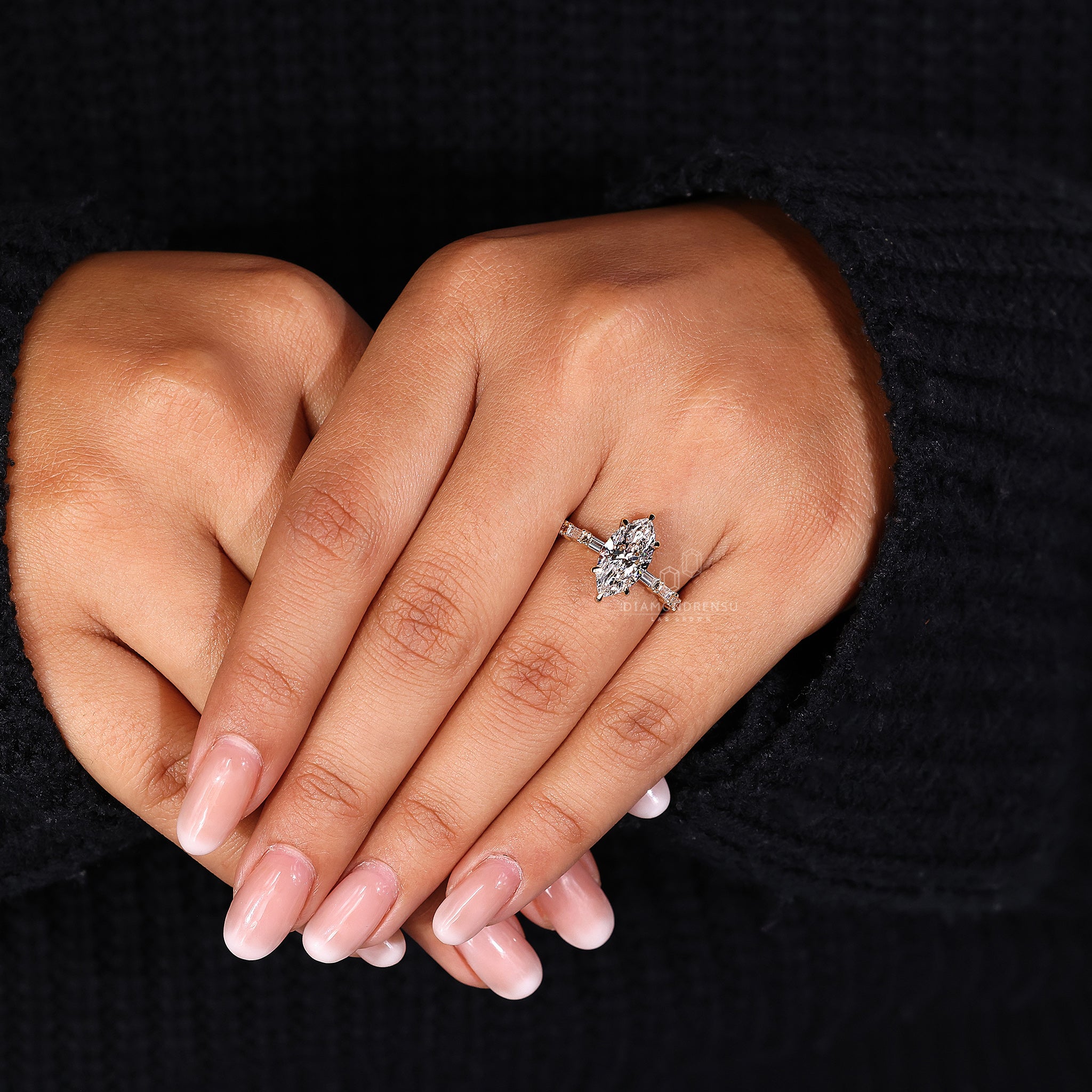 Claw prong gives strength to the marquise cut.

