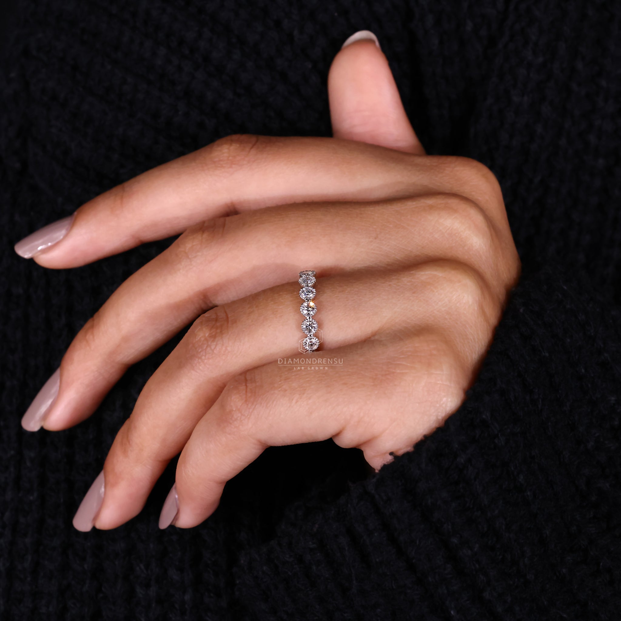 Lab grown diamond eternity wedding band UK.
