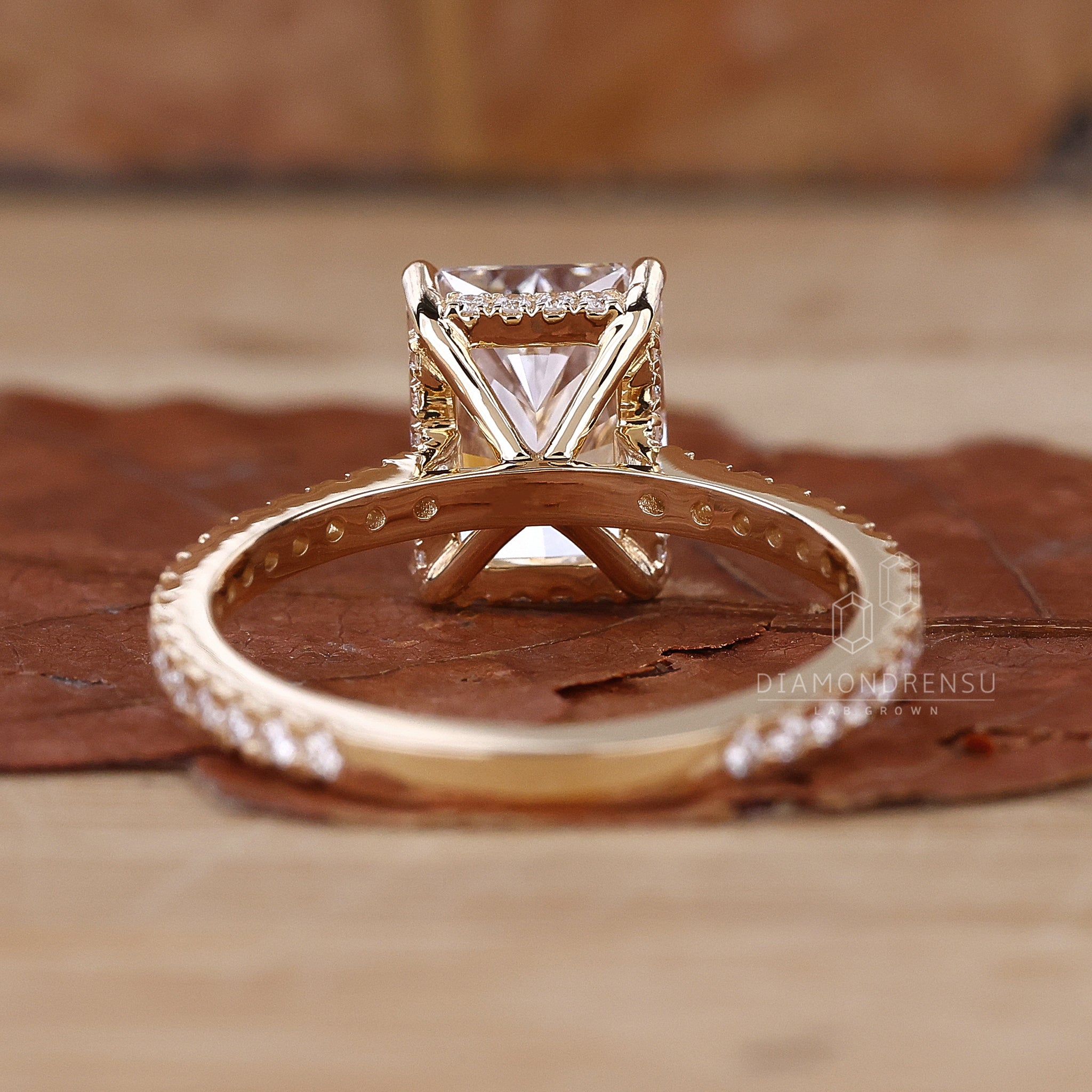 Elegant pave setting ring showcasing a radiant cut diamond.