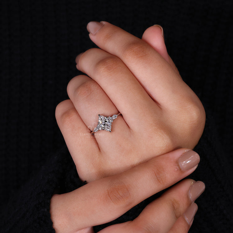 Muse setting paired with white gold engagement ring.

