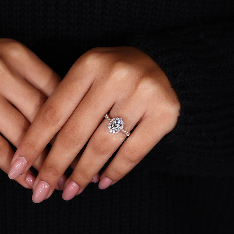 Rose gold ring featuring a tapered pavé set band.
