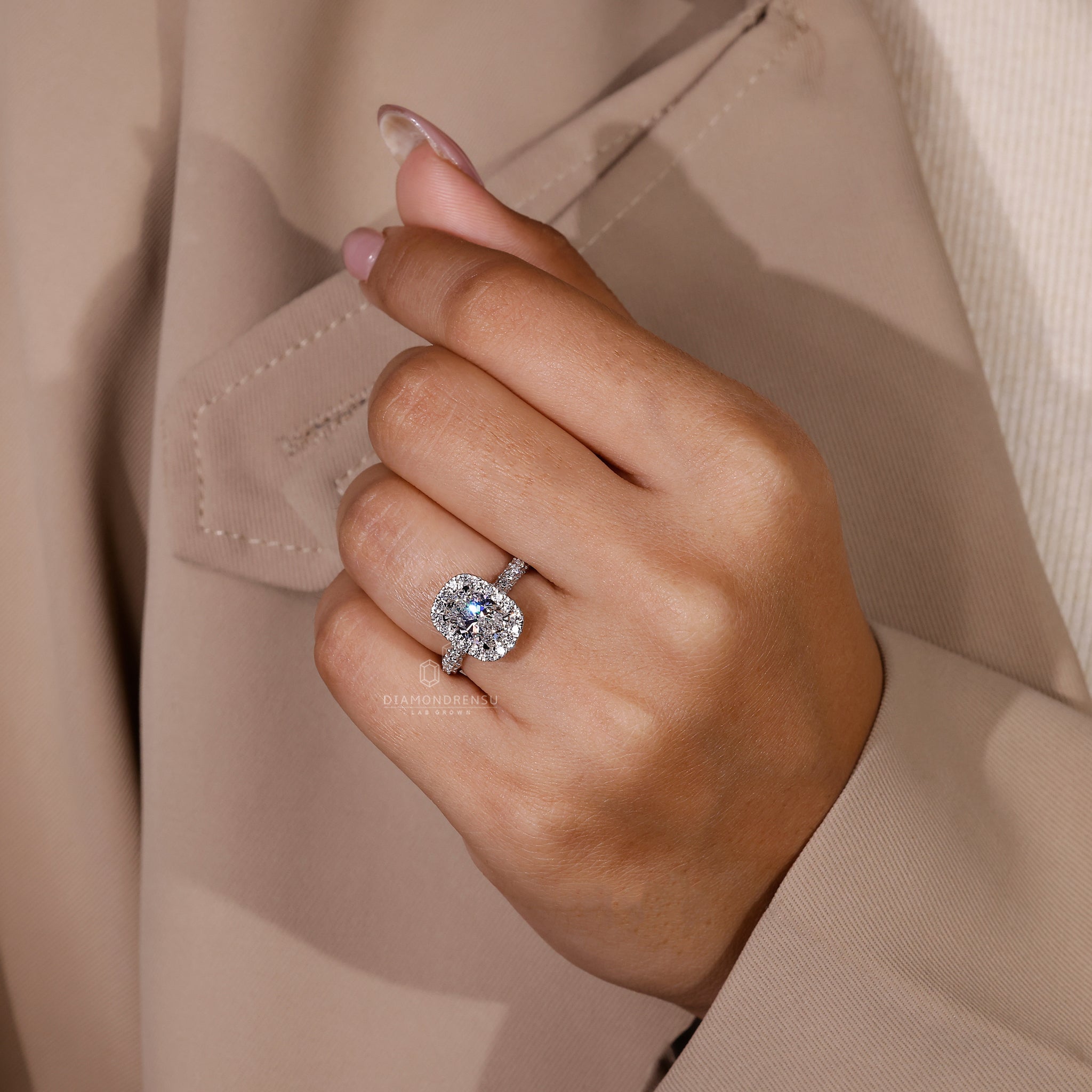 Lab diamond ring featuring halo setting with round diamonds and hidden accents.
