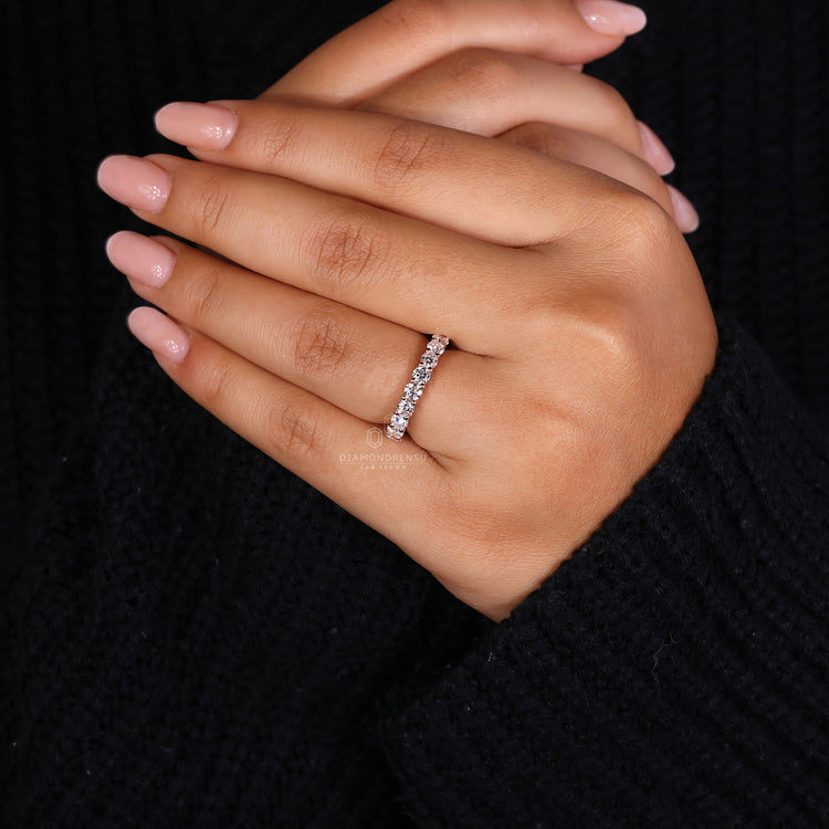 Round diamond wedding band in prong setting
