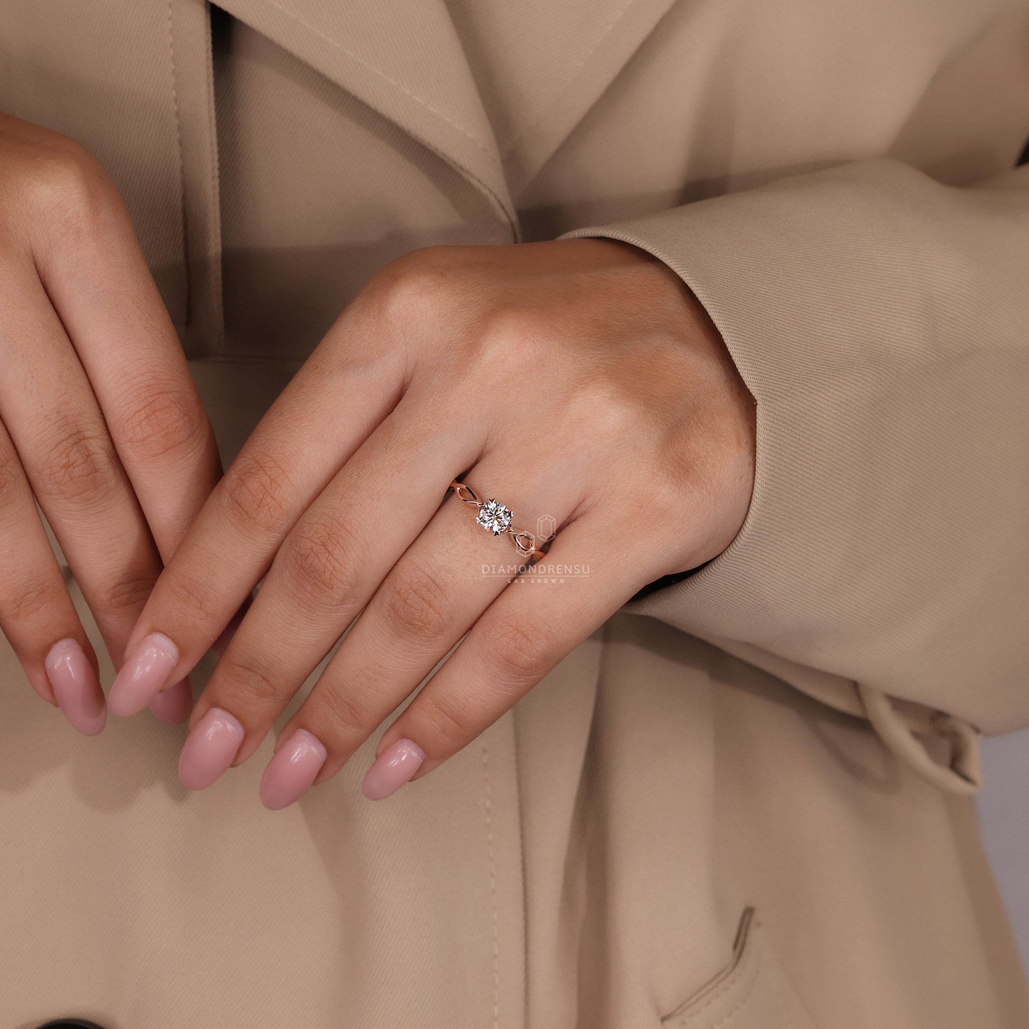 Solitaire diamond ring in rose gold with simple design for proposal engagement ring.

