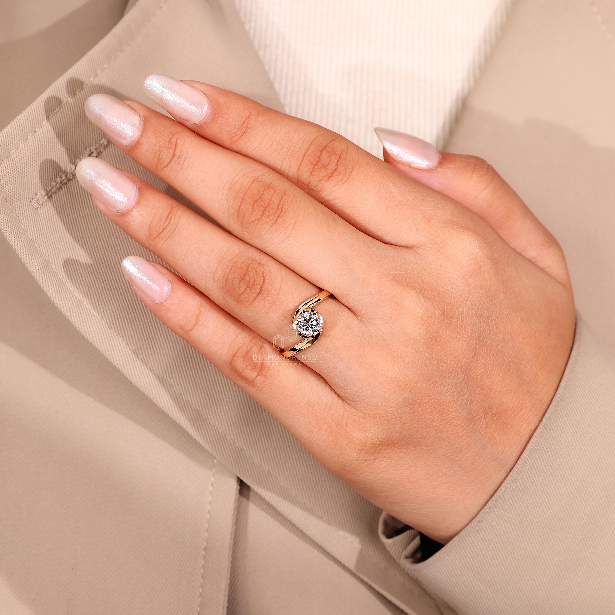 Lab grown diamond engagement ring in yellow gold.
