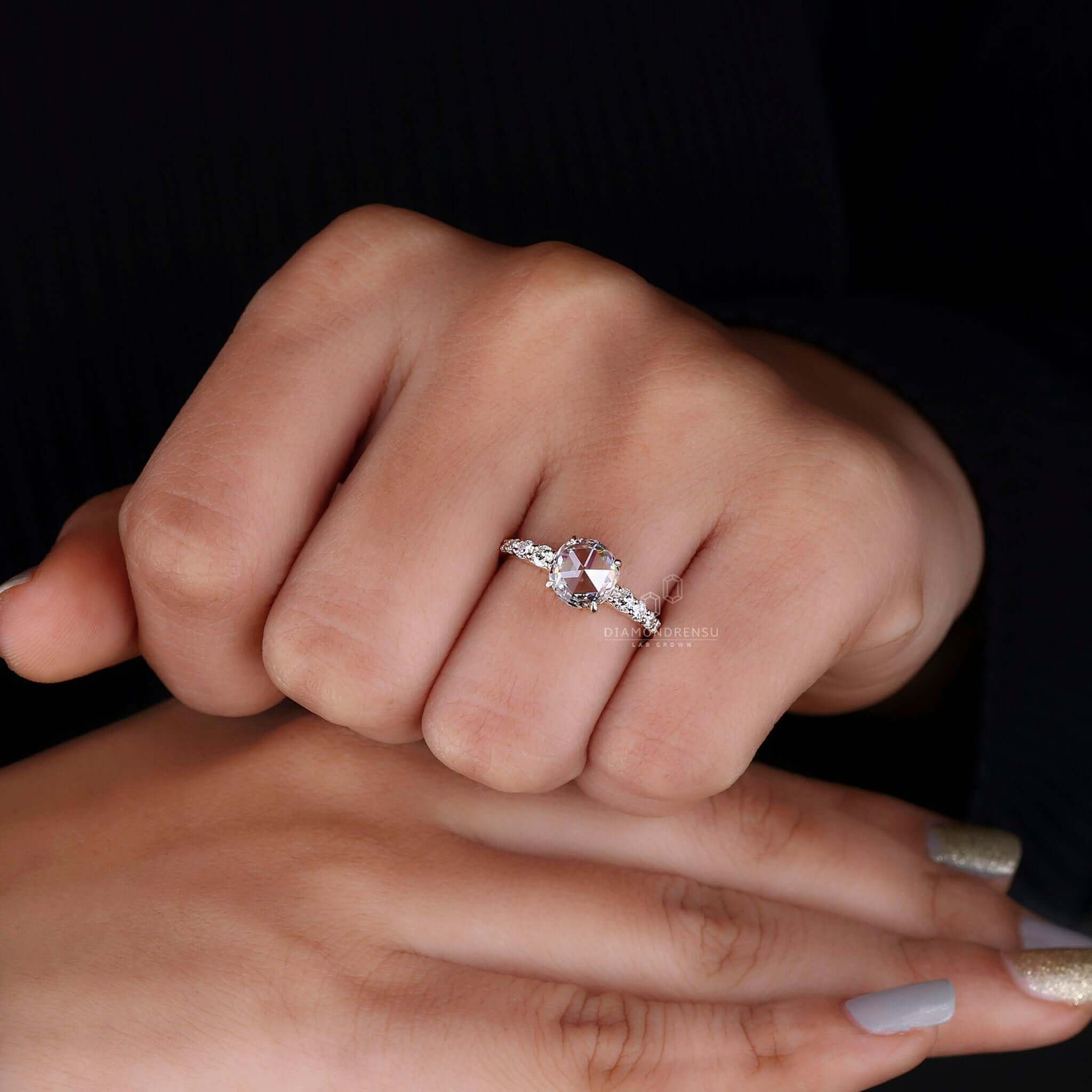 Elegant rose cut diamond ring with multiple rose cut diamonds to enhance its brilliance.