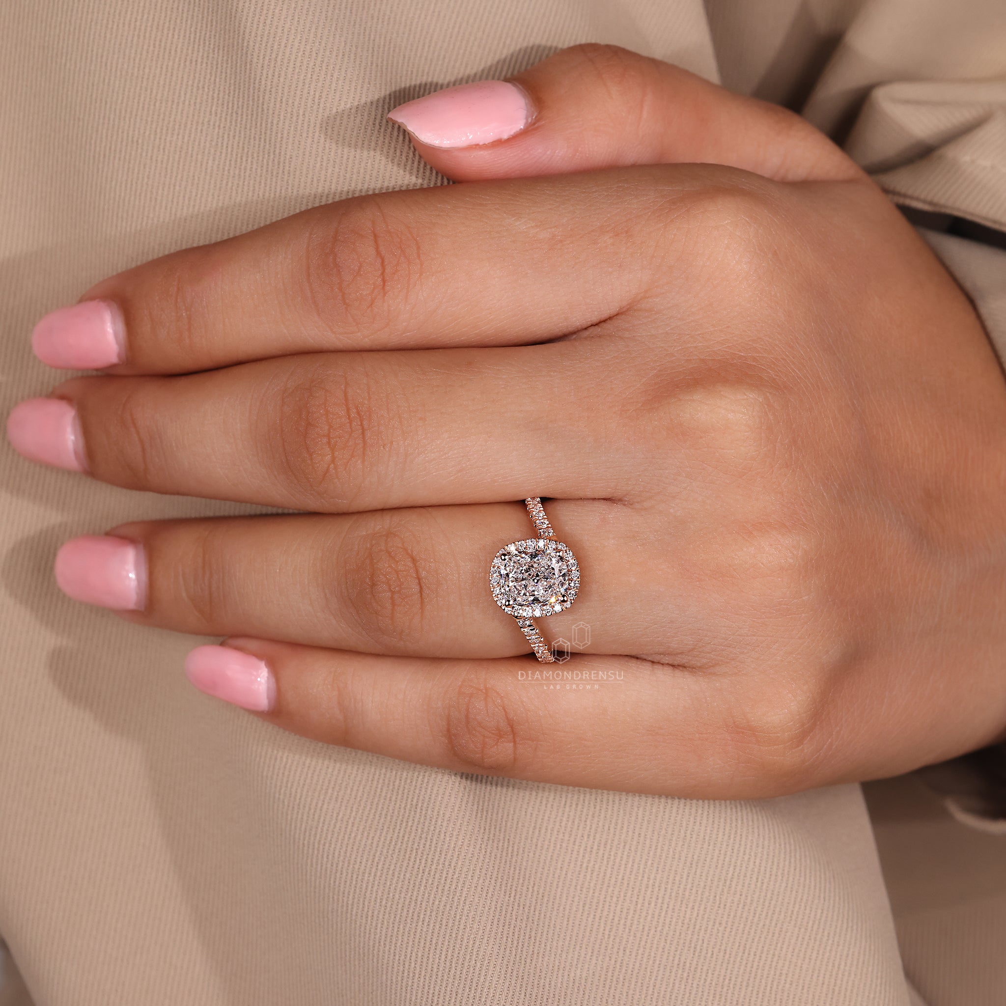 UK engagement ring with bypass and cushion design.
