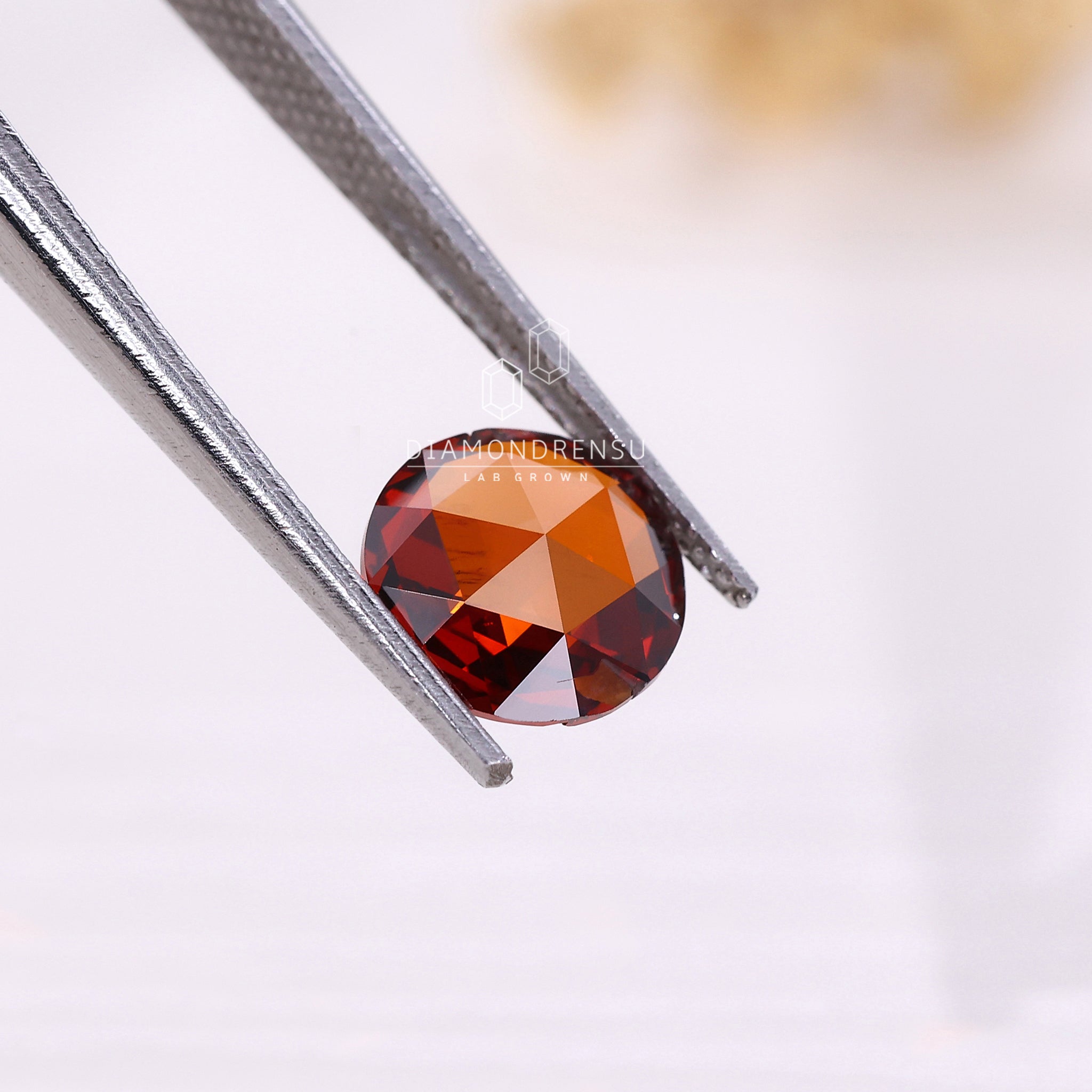 Buy loose lab grown diamond in round rose cut and warm champagne hue.
