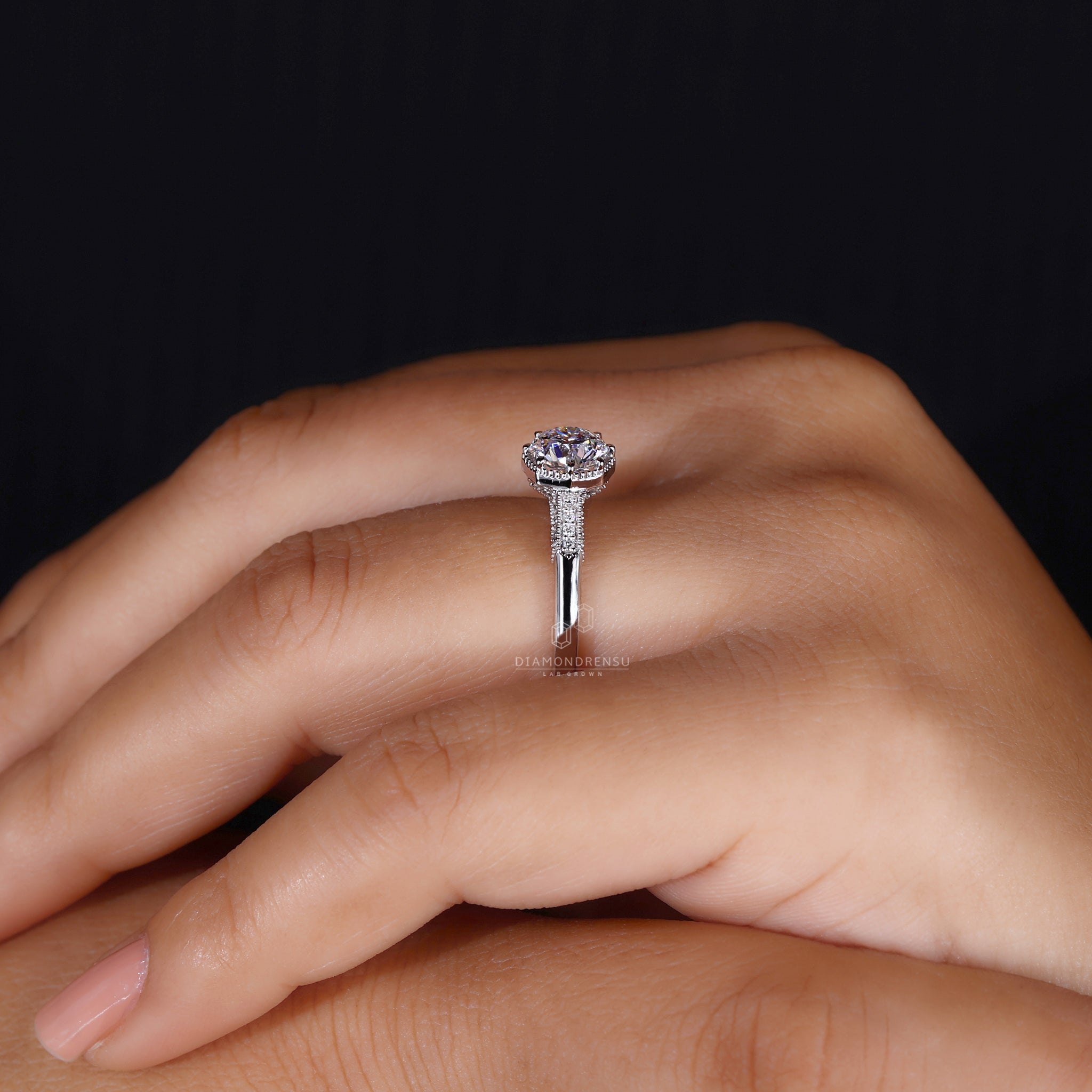Vintage engagement ring with milgrain details.
