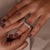 Lab grown diamond halo wedding band with round prong setting
