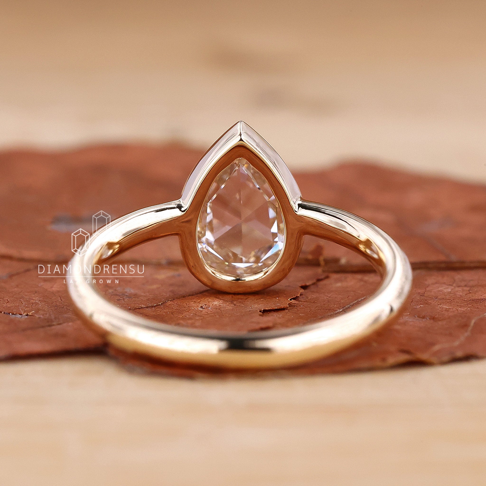 UK engagement ring with rose cut diamond detail
