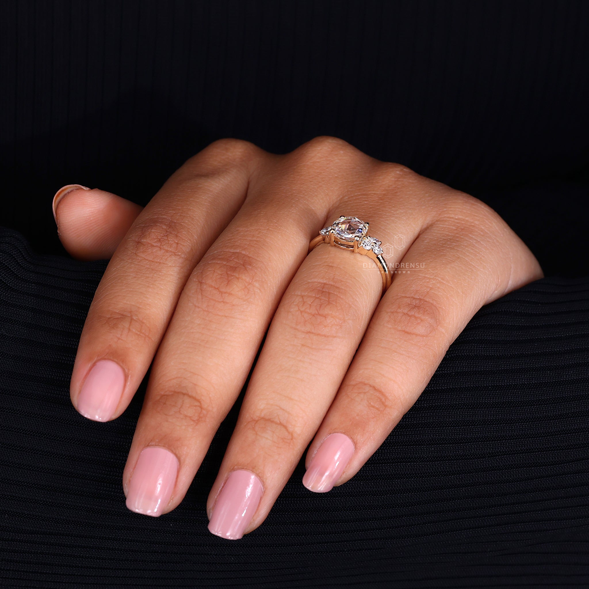 Muse setting ring is used in this rose cut design.

