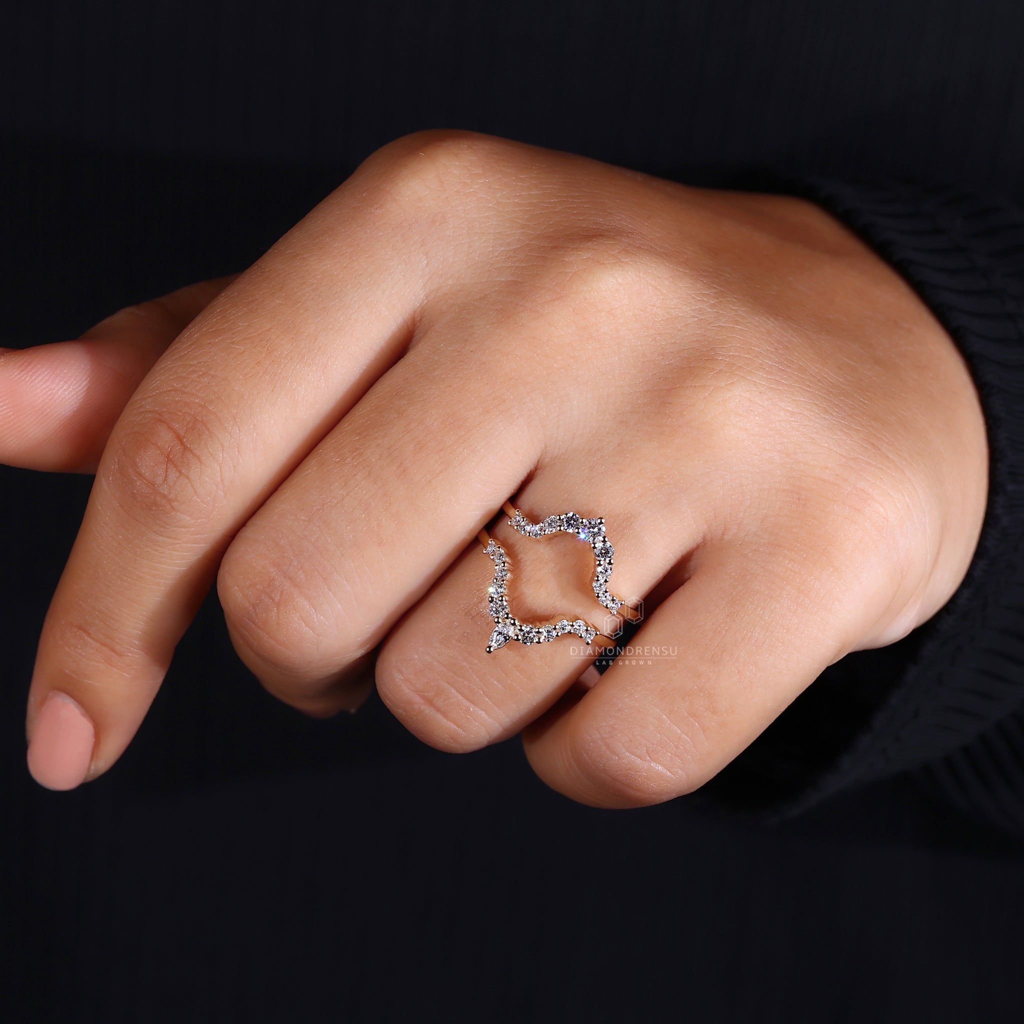 Handmade curved diamond wrap ring.
