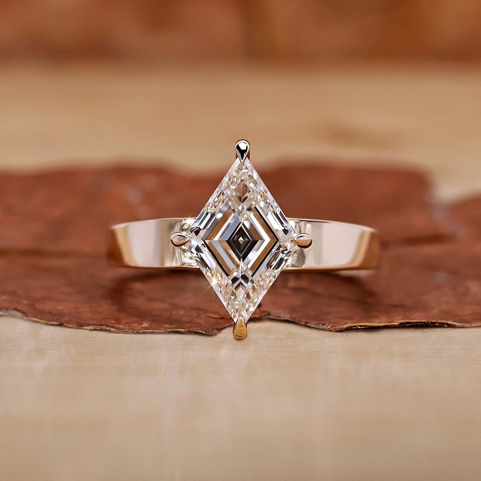 Gold Solitaire Engagement Ring with a stunning diamond centre.