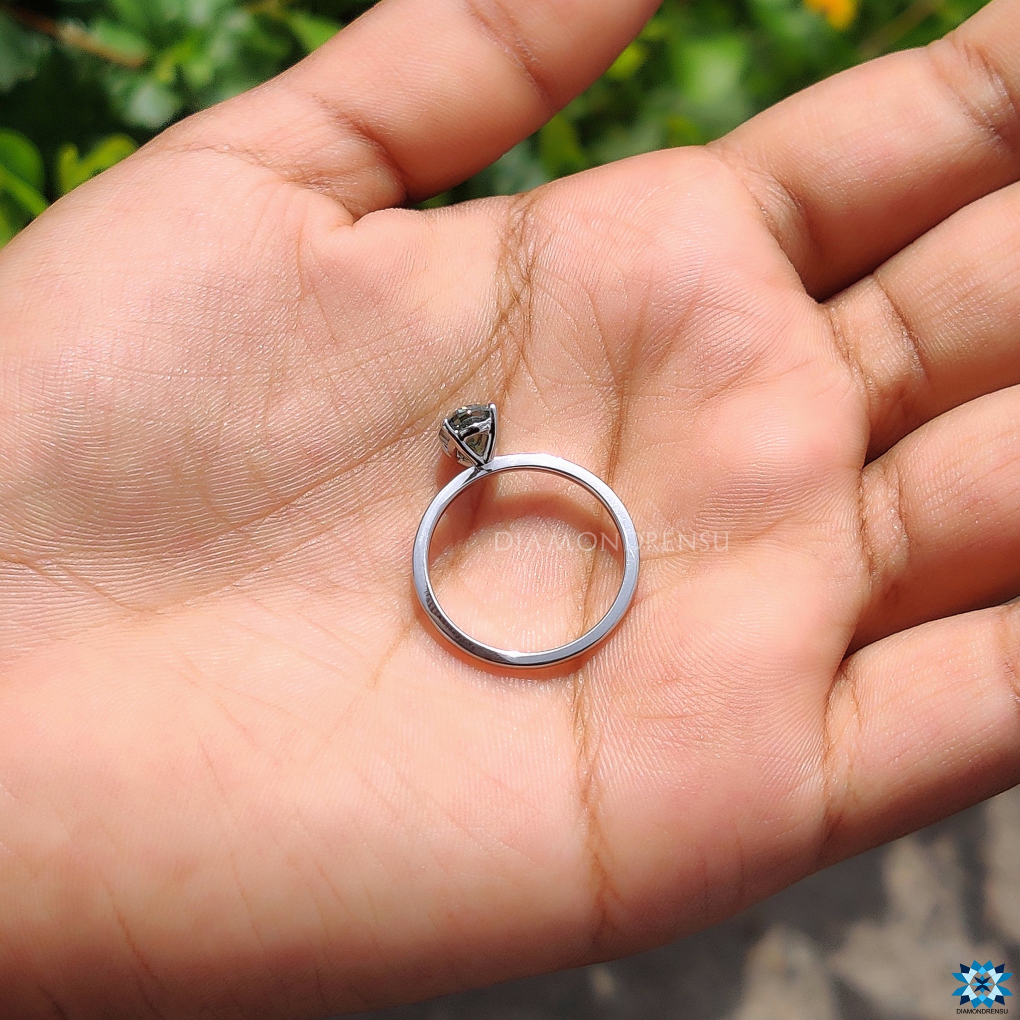 Moissanite ring in prong setting ring style
