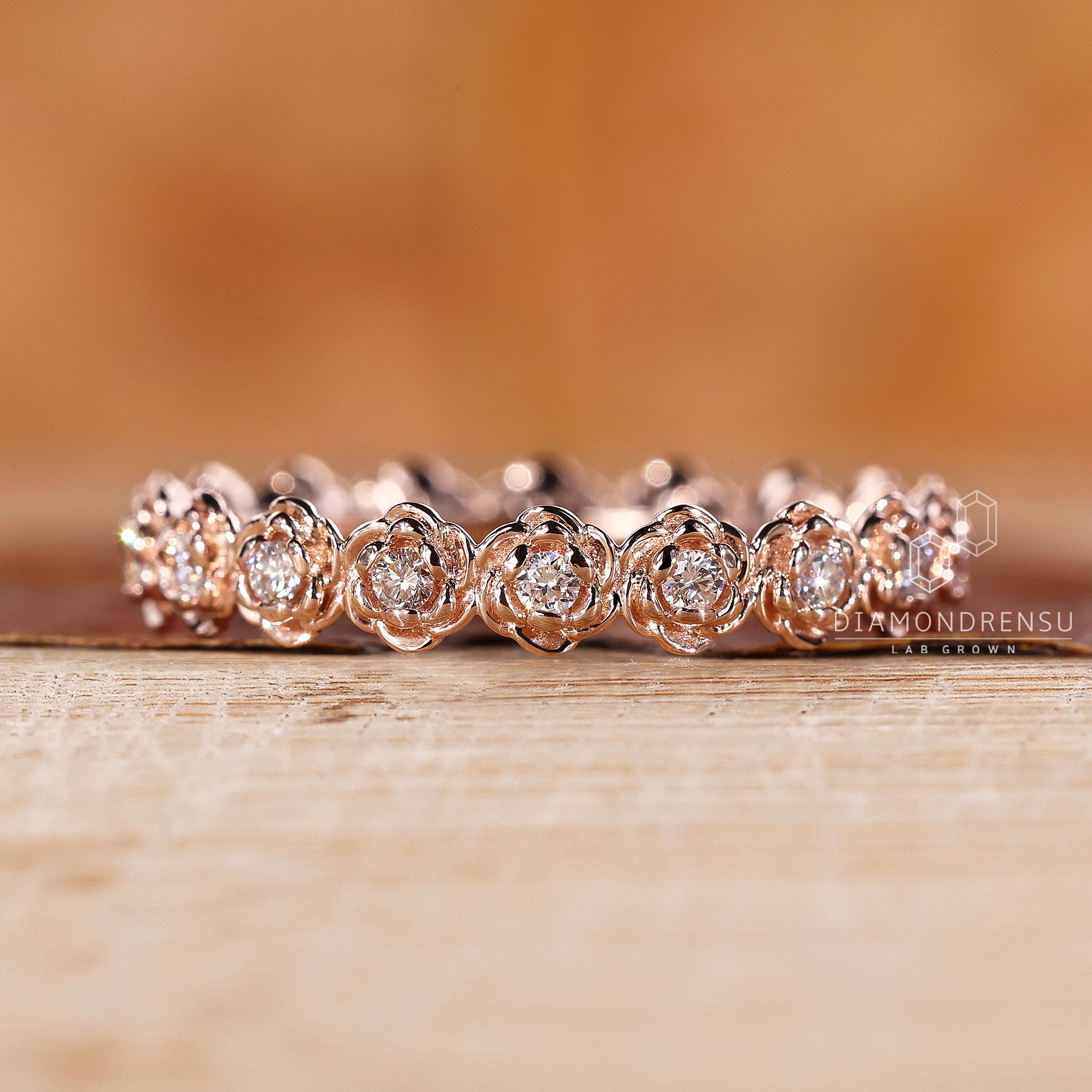 Round diamond wedding band in prong setting
