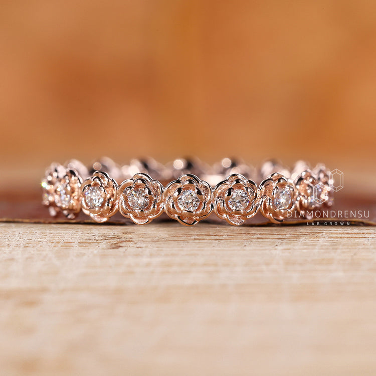 Round diamond wedding band in prong setting
