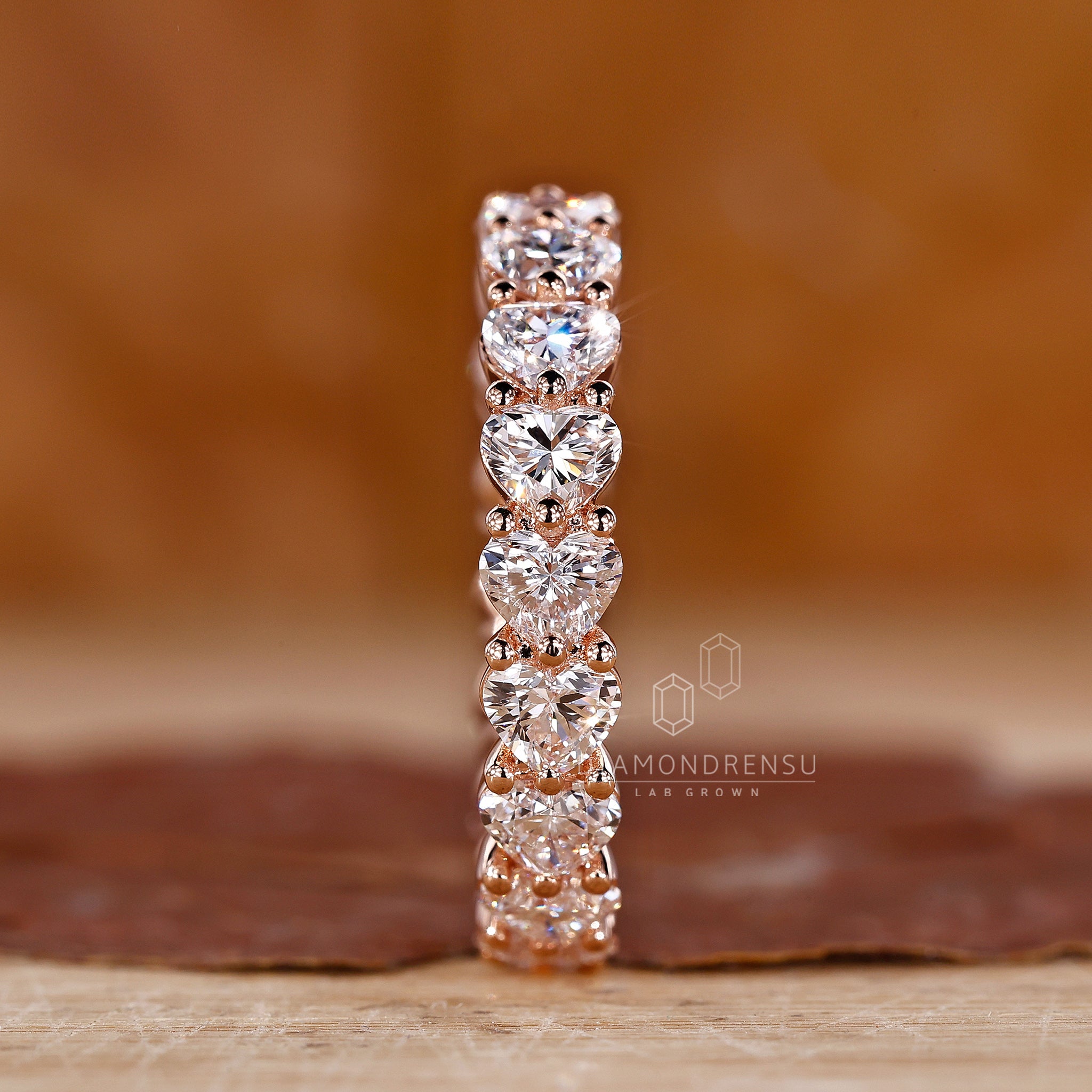 Romantic heart cut eternity wedding ring.

