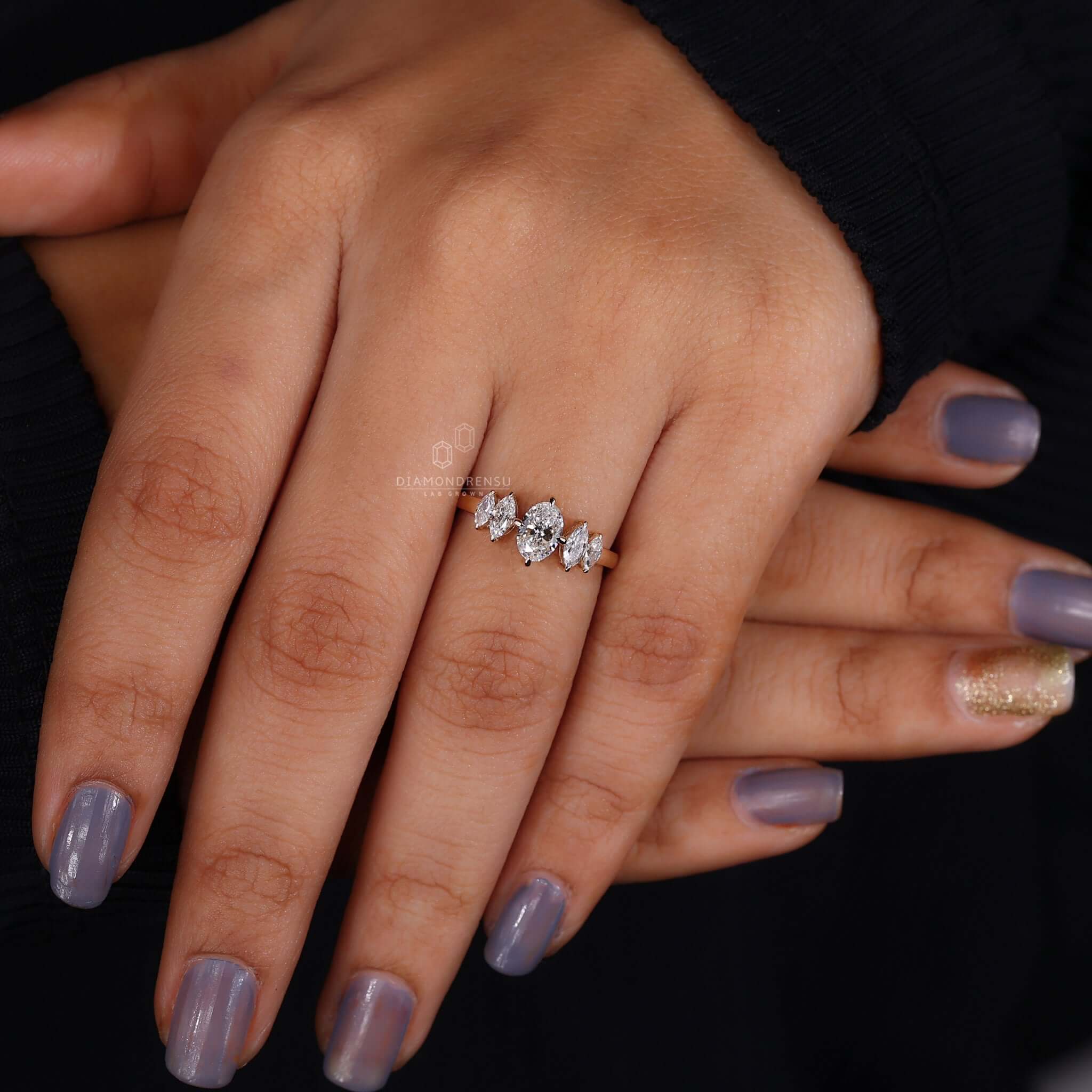 Engagement ring with marquise side stones offering a unique look.