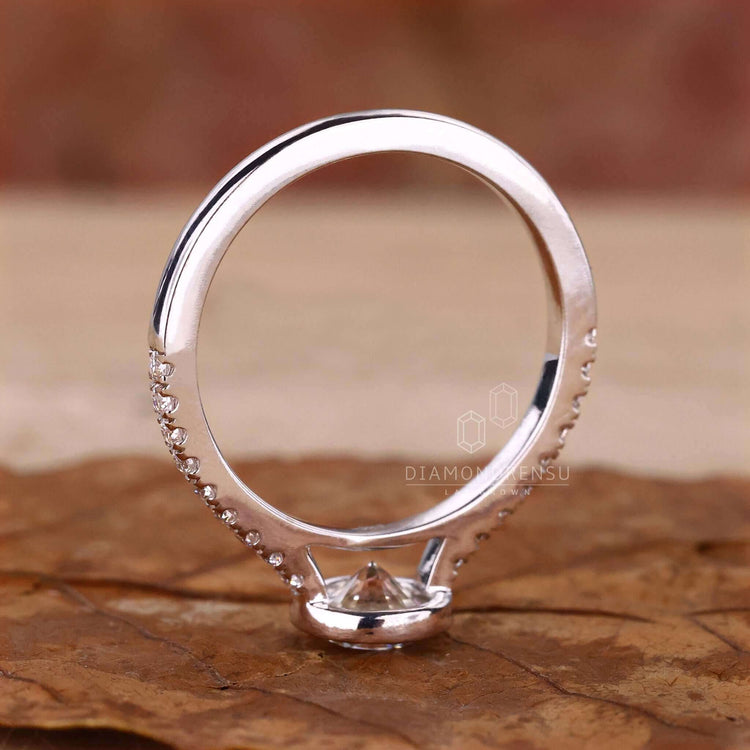 Round engagement ring featuring Lab Grown Diamond in a bezel setting, perfect for sustainable luxury in UK engagement rings
