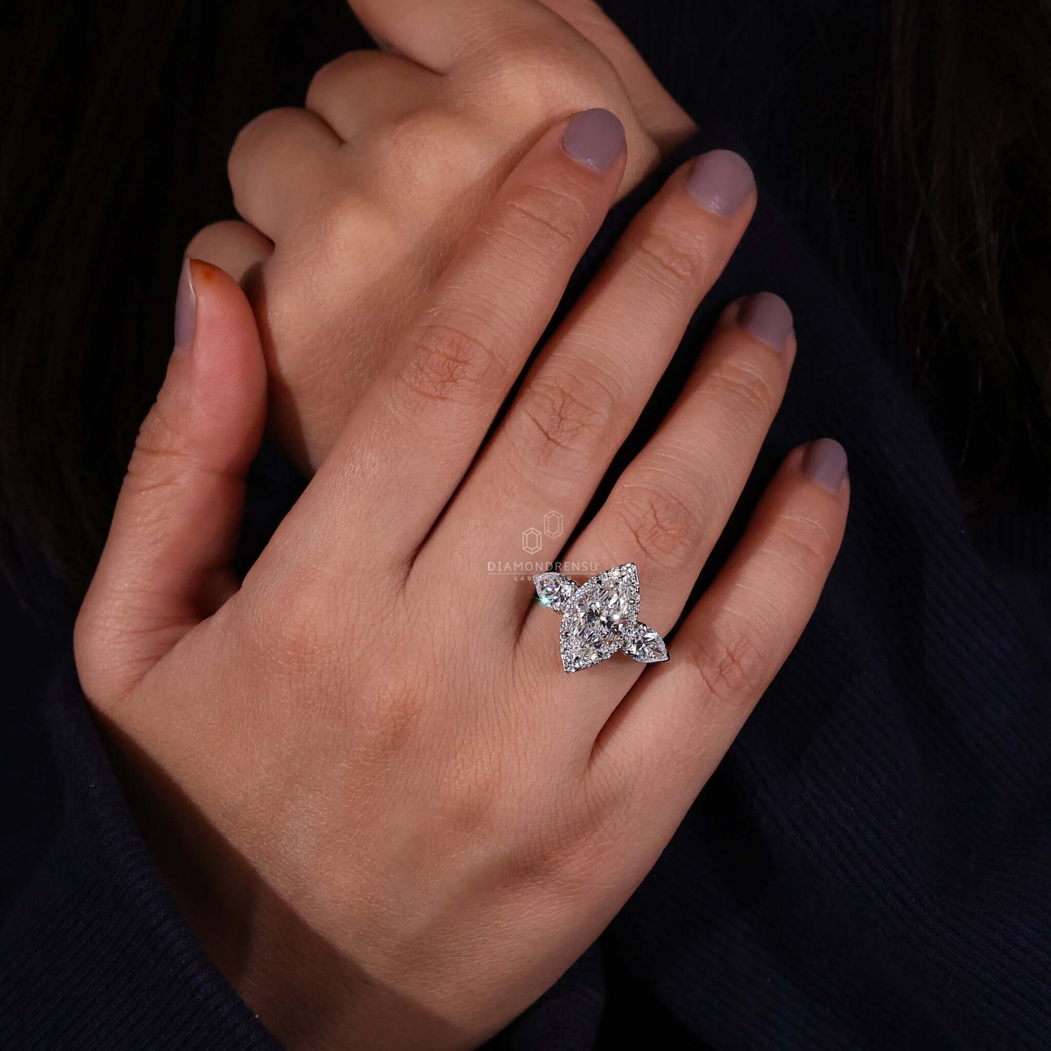 Lab grown marquise diamond ring featuring a halo design, available in the UK.