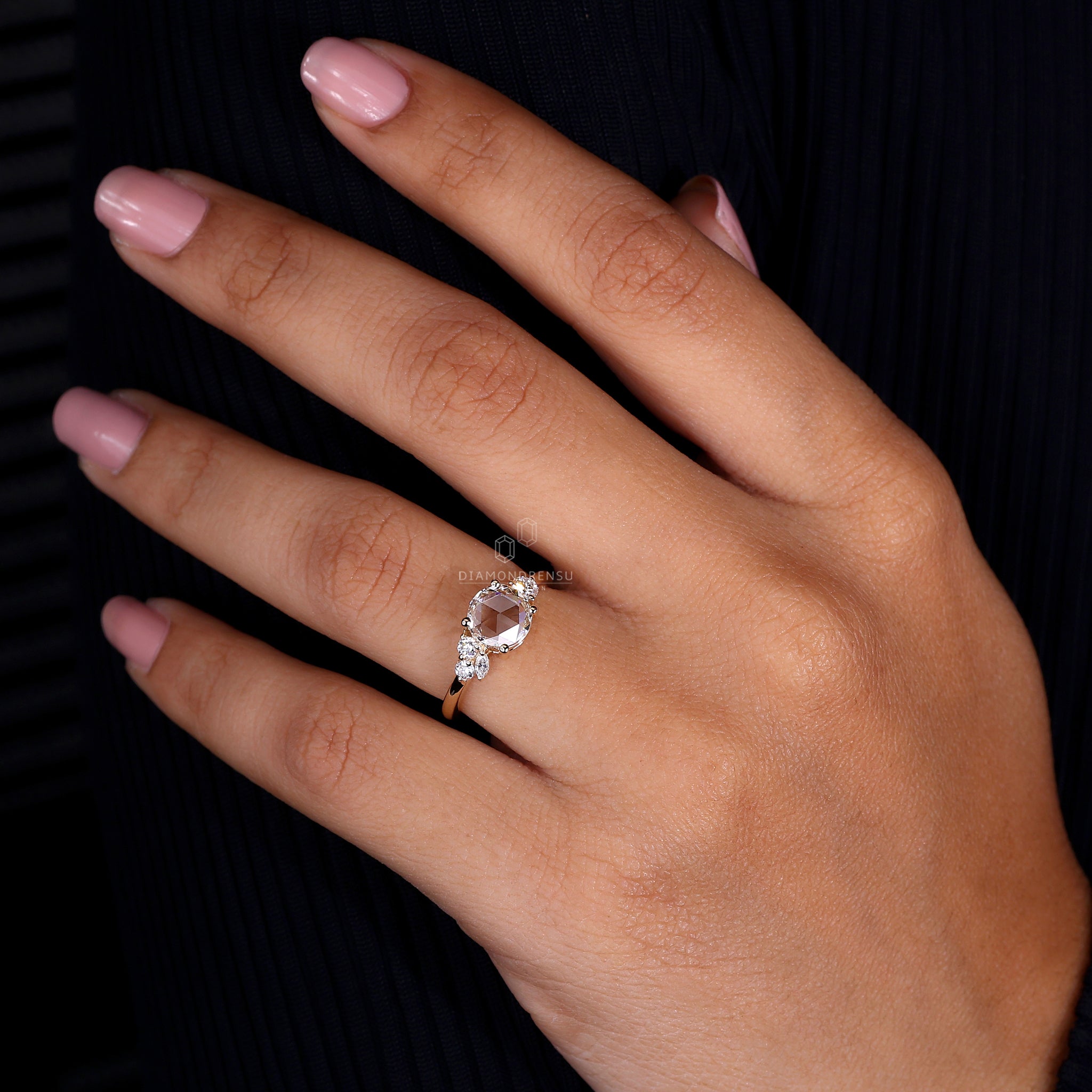 Yellow gold ring adds colour to this engagement ring.
