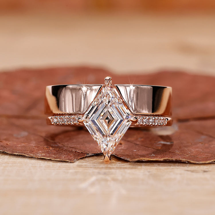 Pave engagement ring paired with a plain wedding band in rose gold.
