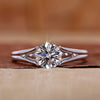 Round solitaire engagement ring has a 4 prong setting.
