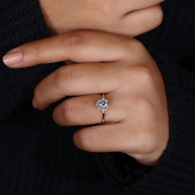 Elegant half halo style ring with round center.
