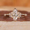 Marquise cluster diamond ring in yellow gold for UK engagement ring.
