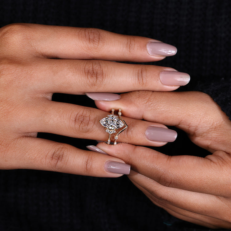 Milgrain setting ring with claw prong ring and round diamond wedding band.
