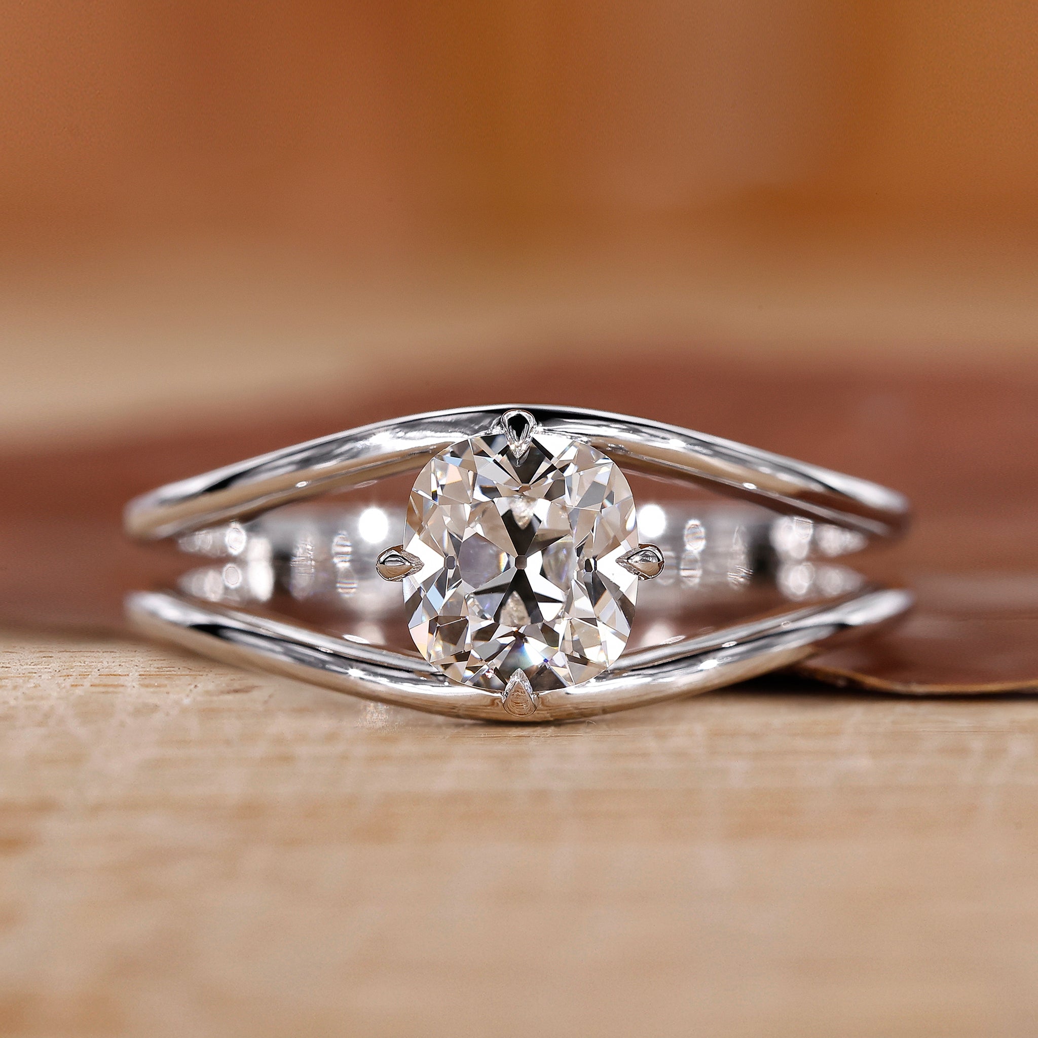 Old mine cut diamond ring in a yellow gold diamond ring.
