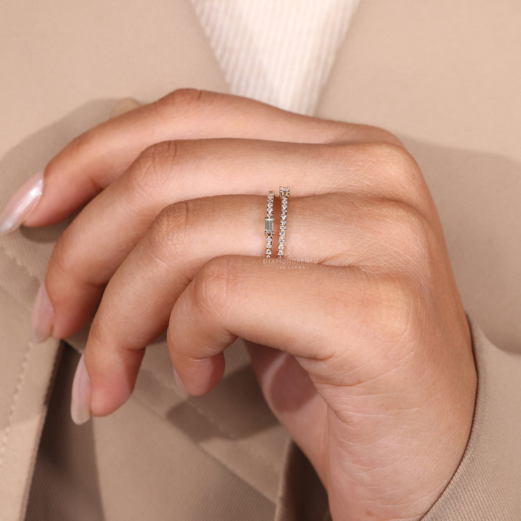 Yellow gold wedding band with baguette and round diamonds.
