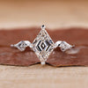 3 stone engagement ring with lozenge cut ring design.
