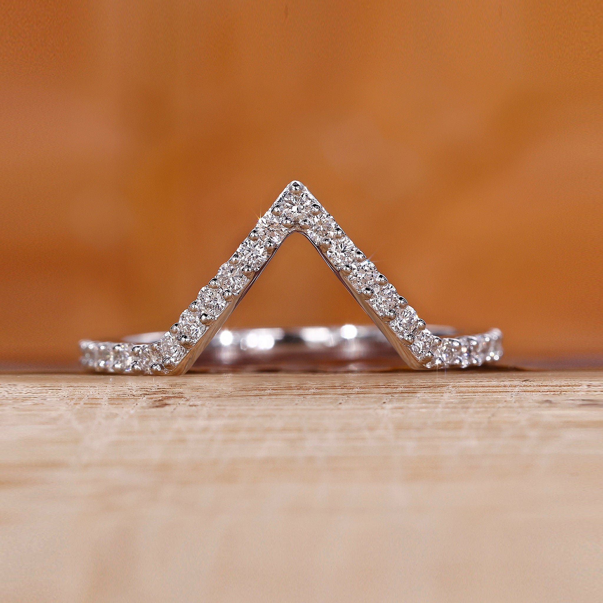 V shaped wedding band crafted in white gold with a modern design.