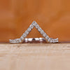 V shaped wedding band crafted in white gold with a modern design.