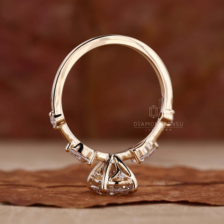 Oval cut three stone ring featuring Lab Grown Diamonds, designed for sustainable beauty and unmatched brilliance.
