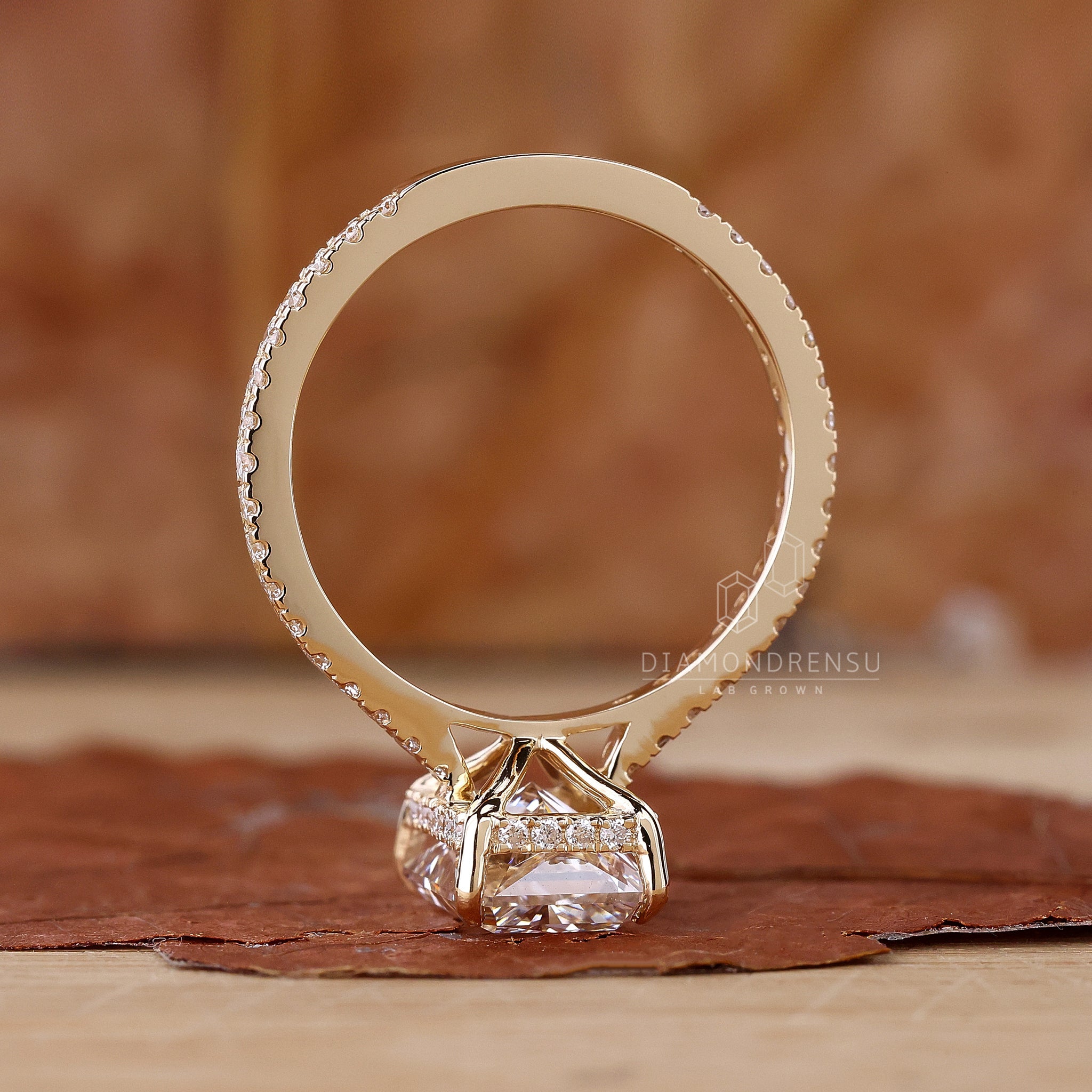 Hidden halo engagement ring crafted with lab grown diamonds.