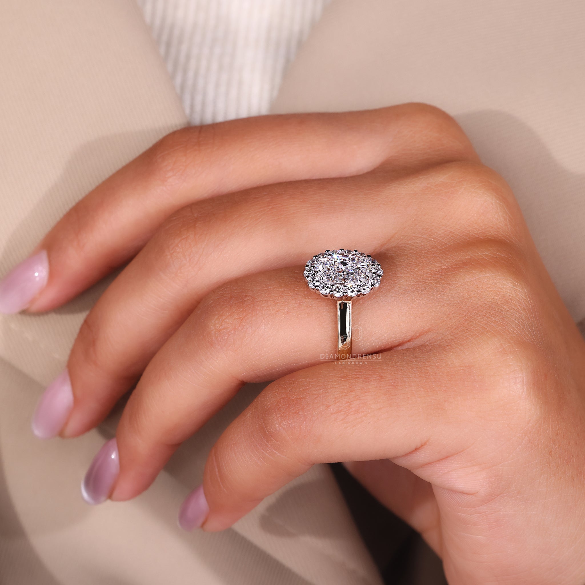 Cathedral setting ring crafted in white and yellow gold.
