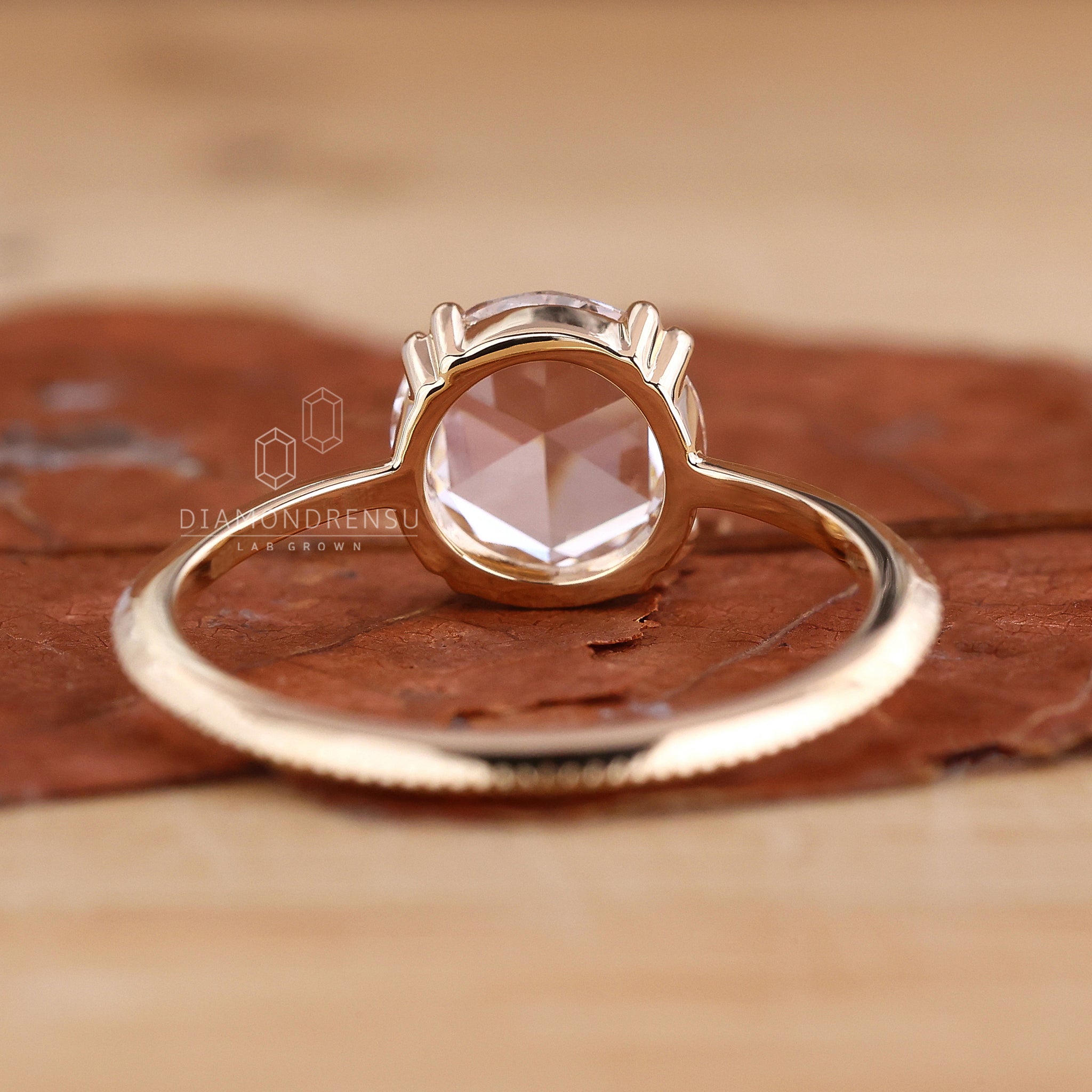 Lab diamond ring with milgrain setting and round rose cut solitaire diamond.
