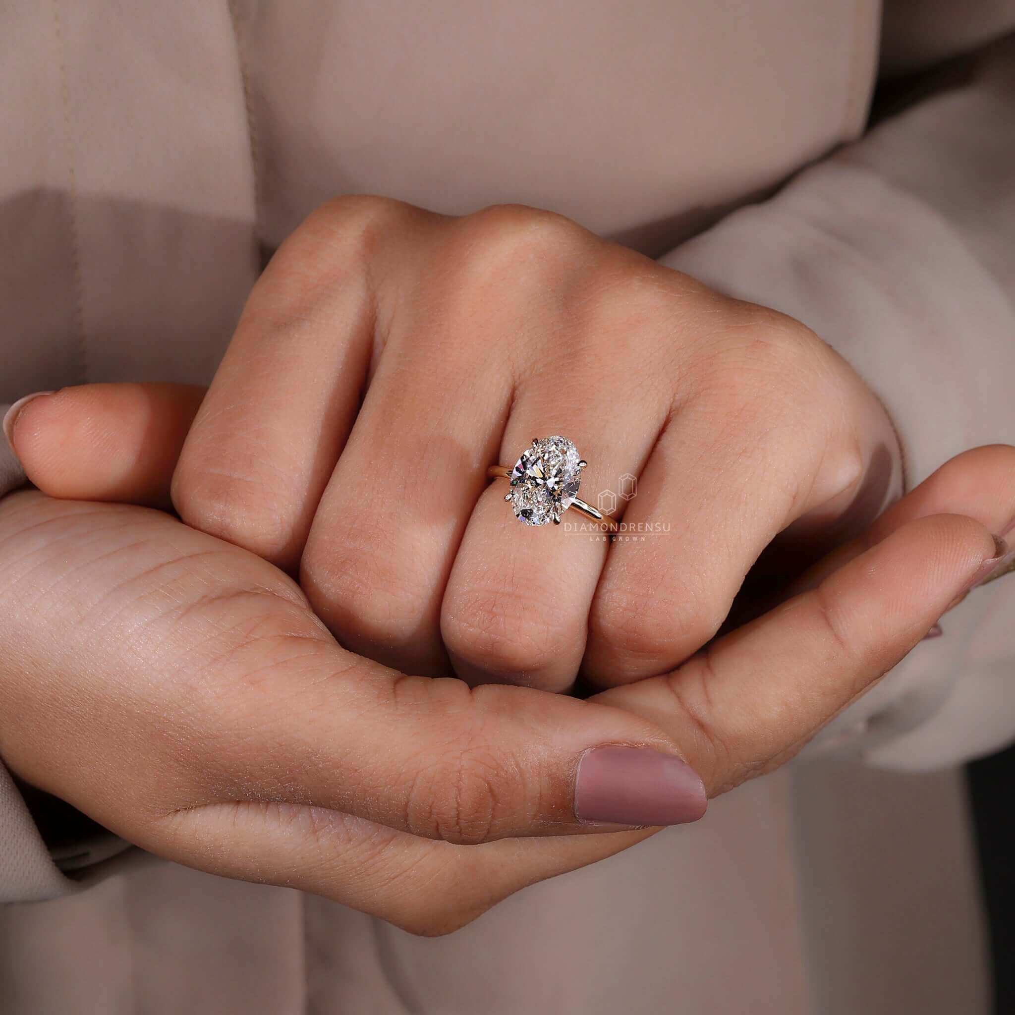 UK engagement ring featuring a stunning oval diamond and superior craftsmanship.