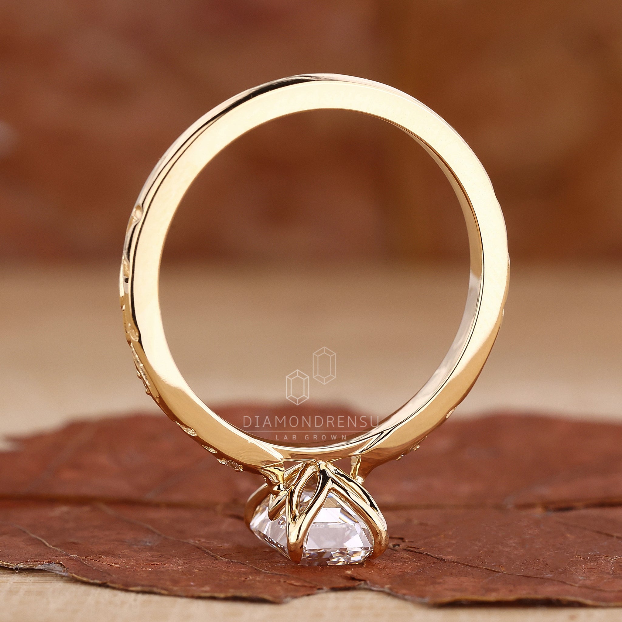 Buy engagement ring with emerald cut diamond.
