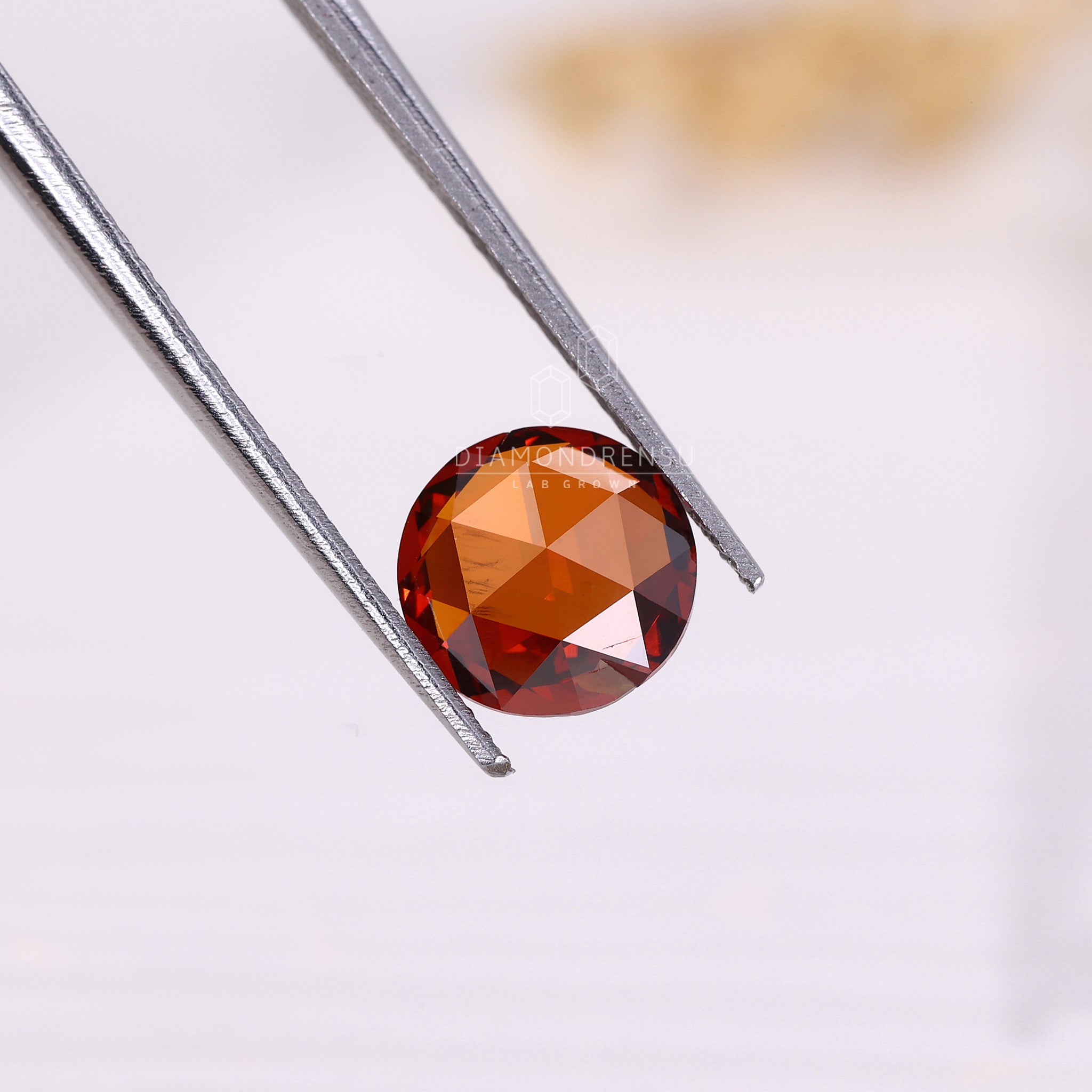 Champagne diamond loose with rose cut facets and ethical sourcing.
