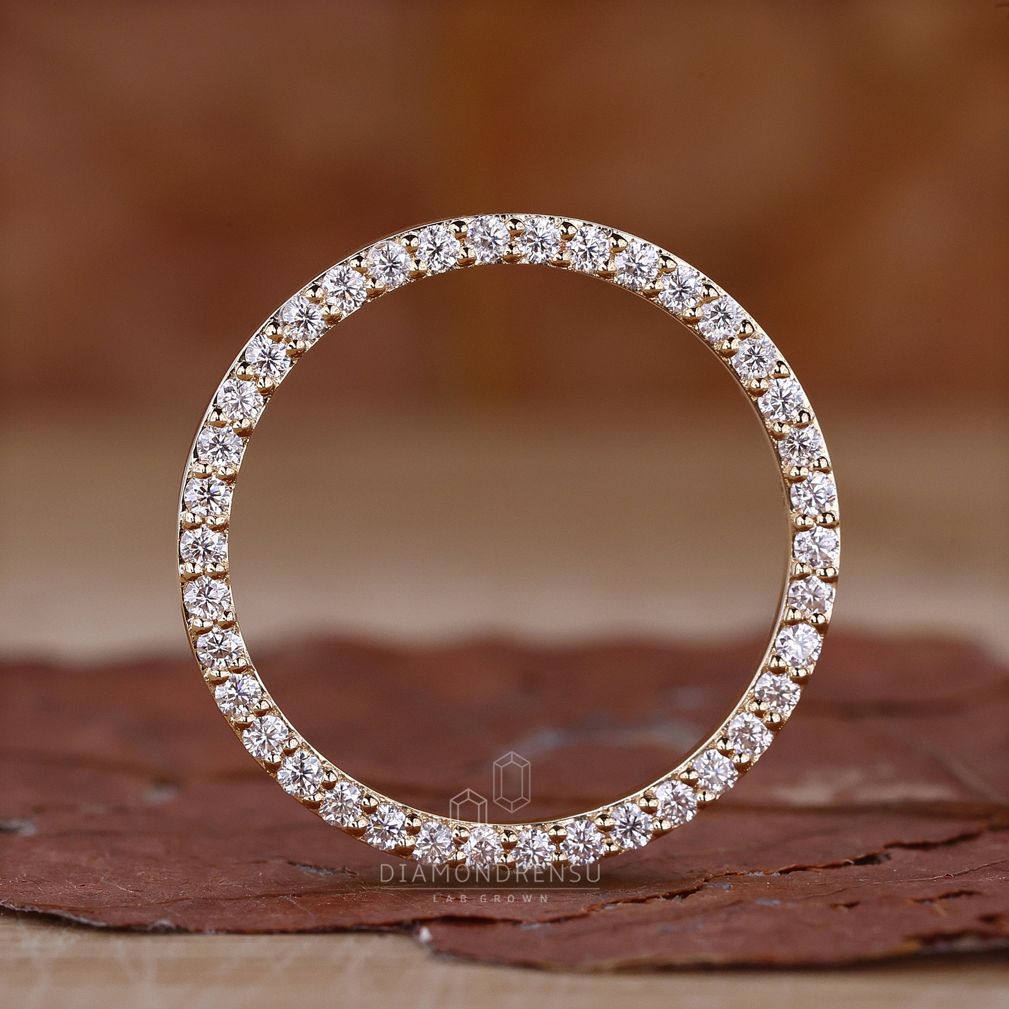 Lab grown diamond eternity band in gold.
