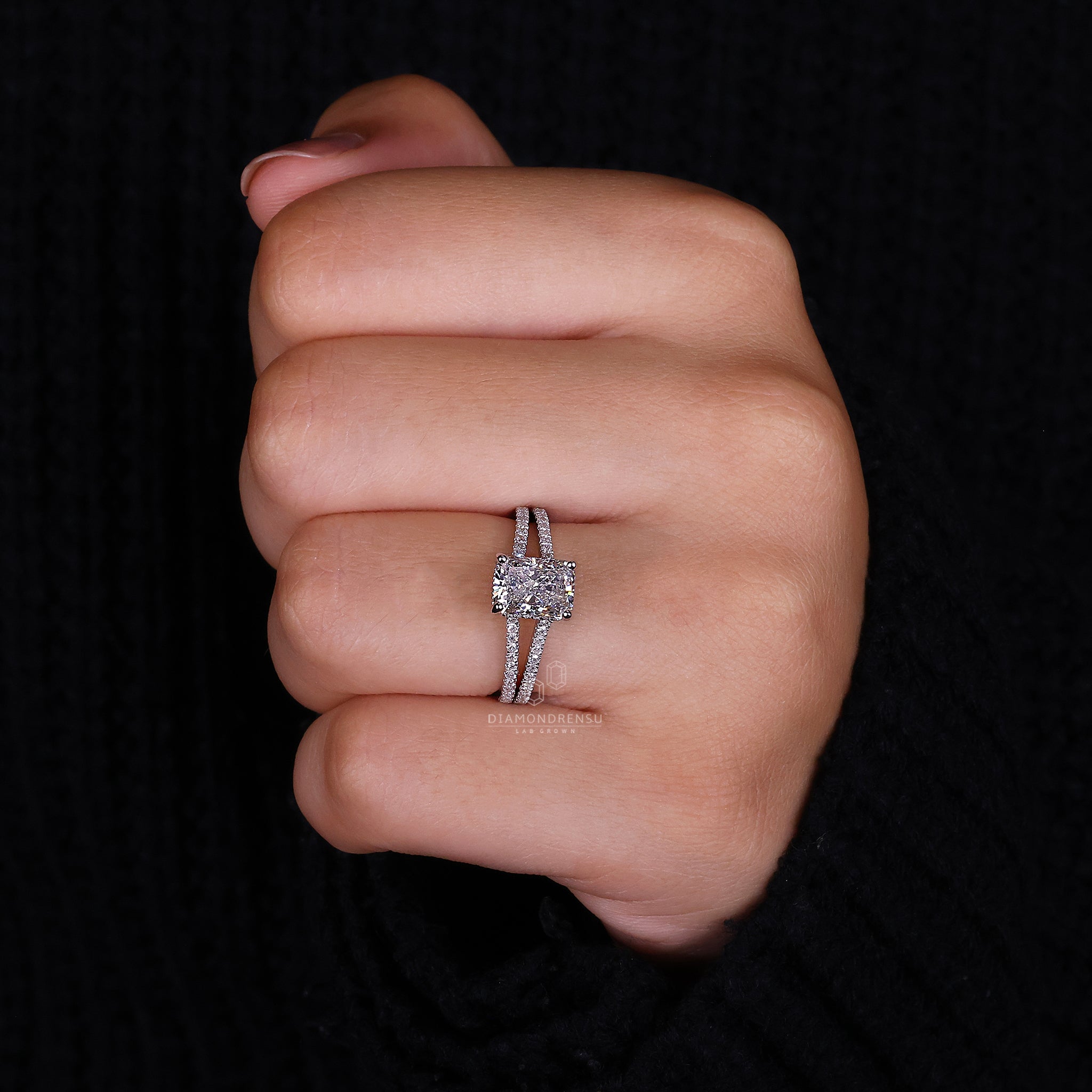 Custom UK engagement ring with a 4 prong pavé setting.
