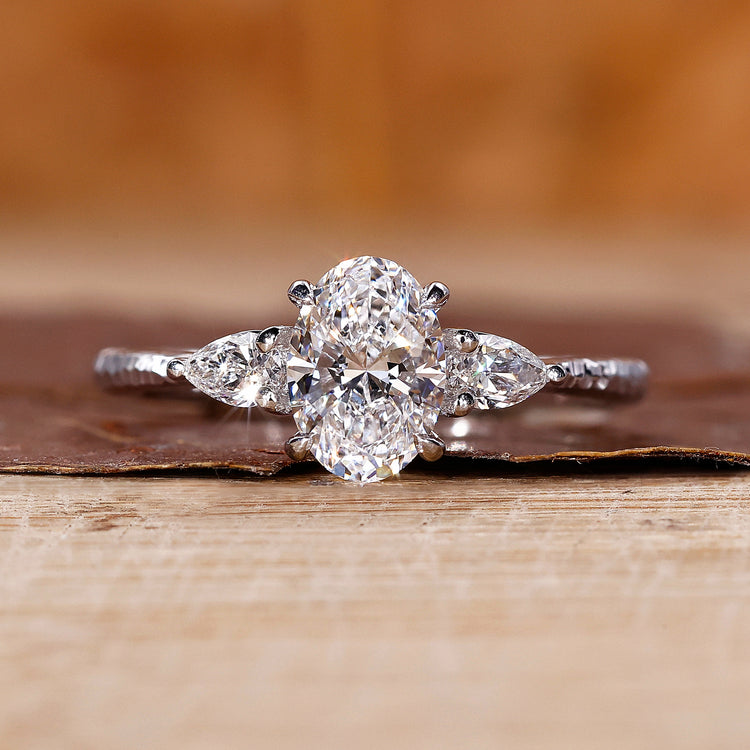 3 Stone Diamond Engagement Ring with claw prong ring setting.
